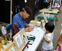 似顔絵屋さん